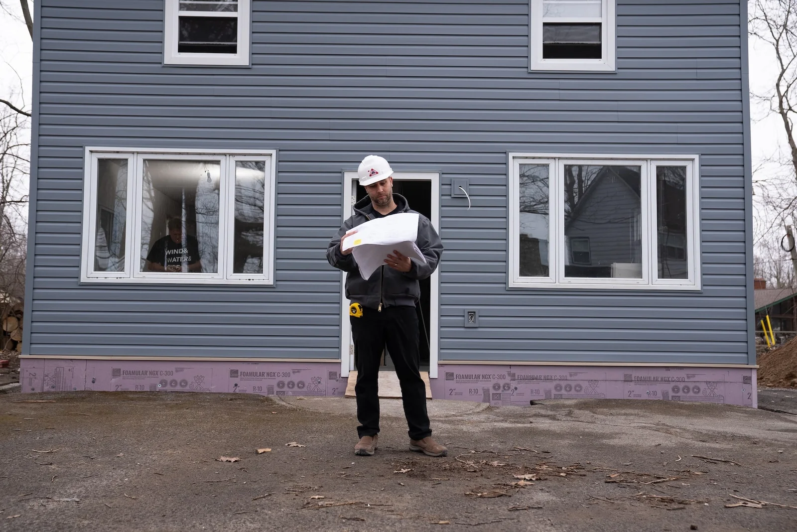 torm damaged roof with missing shingles and water intrusion after a severe Alberta windstorm