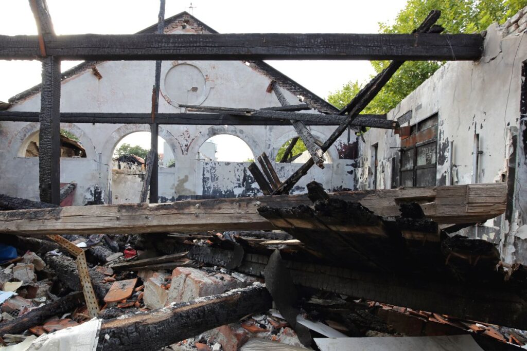 DKI Calgary restoration crew performing emergency board-up on fire damaged property